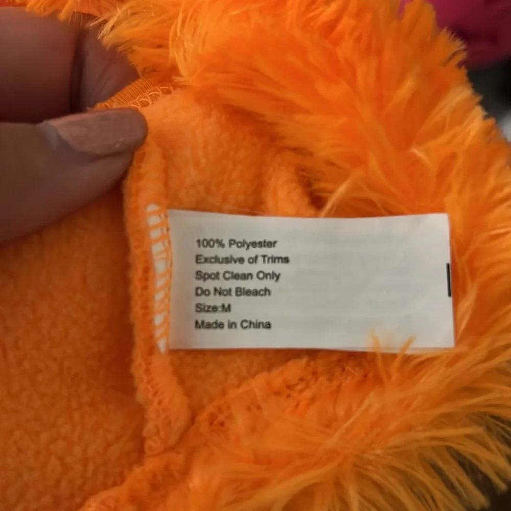 pumpkin costume size; M fits a shihpoo